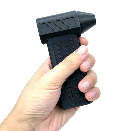 Soplador de aire Turbo Jet negro compacto en mano, diseño ergonómico para limpieza y secado.